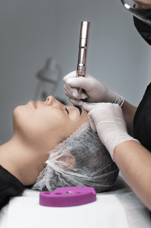 young-woman-going-through-microblading-treatment klein